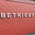 Buchstaben "Betriebsfeuerwehr"